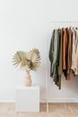 White Ceramic Vase With Brown and Beige Towels