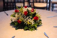 Red and White Roses Bouquet on White Table