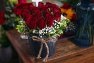 Red Roses in Blue Ceramic Vase