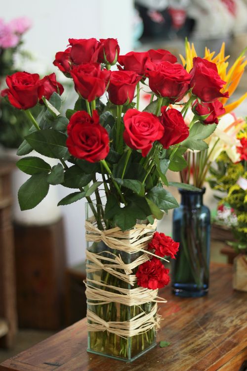 Vase For Roses A Red Roses on a Clear Glass Vase · Free Stock Photo