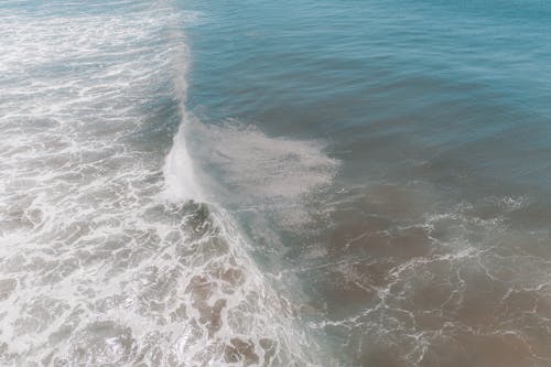 Stormy sea waving on sunny day