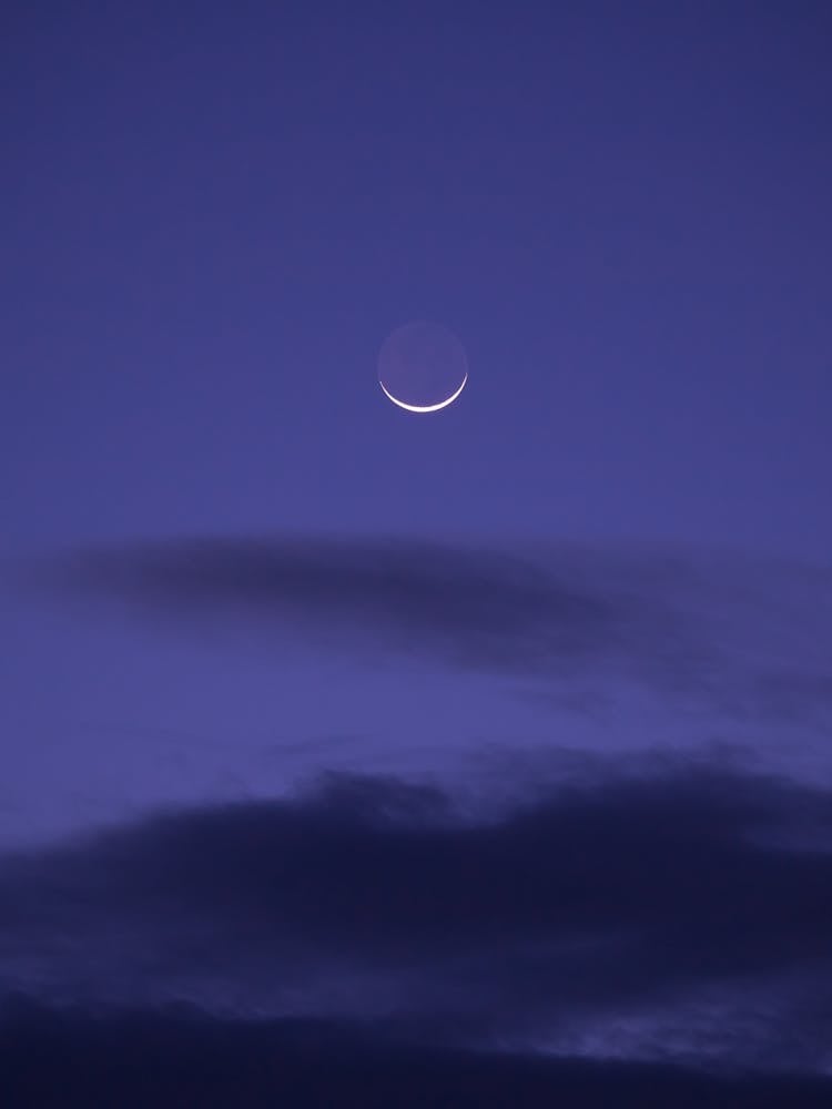 Crescent Moon In The Purple Sky