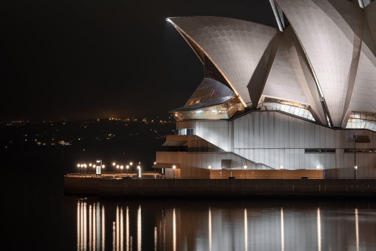Exterior Of Futuristic Sydney Opera House At Night