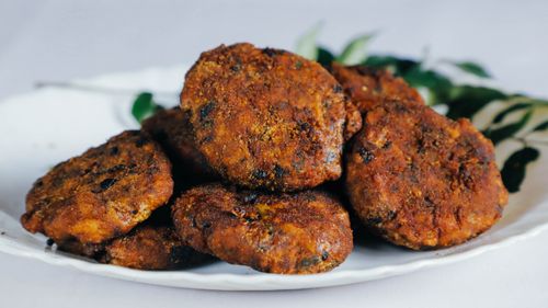 Free Mouthwatering fried cutlets served on a white plate, perfect for a delicious meal. Stock Photo