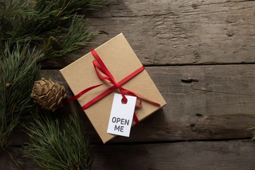 Gift box with Open Me title on tag