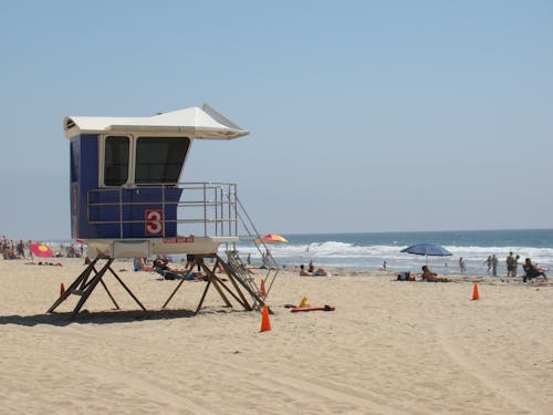 Blue and Gray Guardhouse on Beach