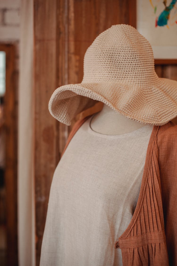 Mannequin With Clothes And Hat In Shop