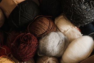 Assorted balls of natural-dyed yarn, photo by Arina Krasnikova on Pexels