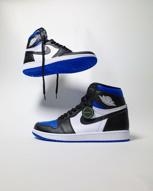 Free Minimalist photo of stylish high-top basketball sneakers on white background. Stock Photo