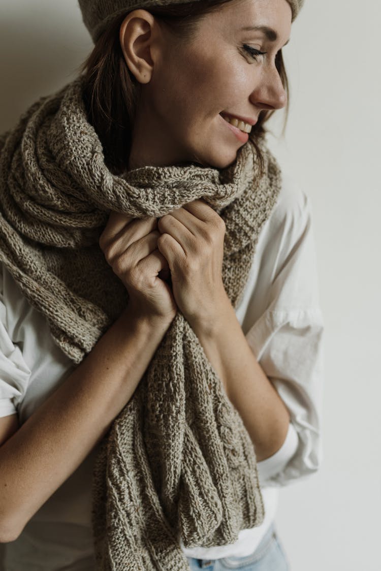 Woman Wearing Knitted Scarf