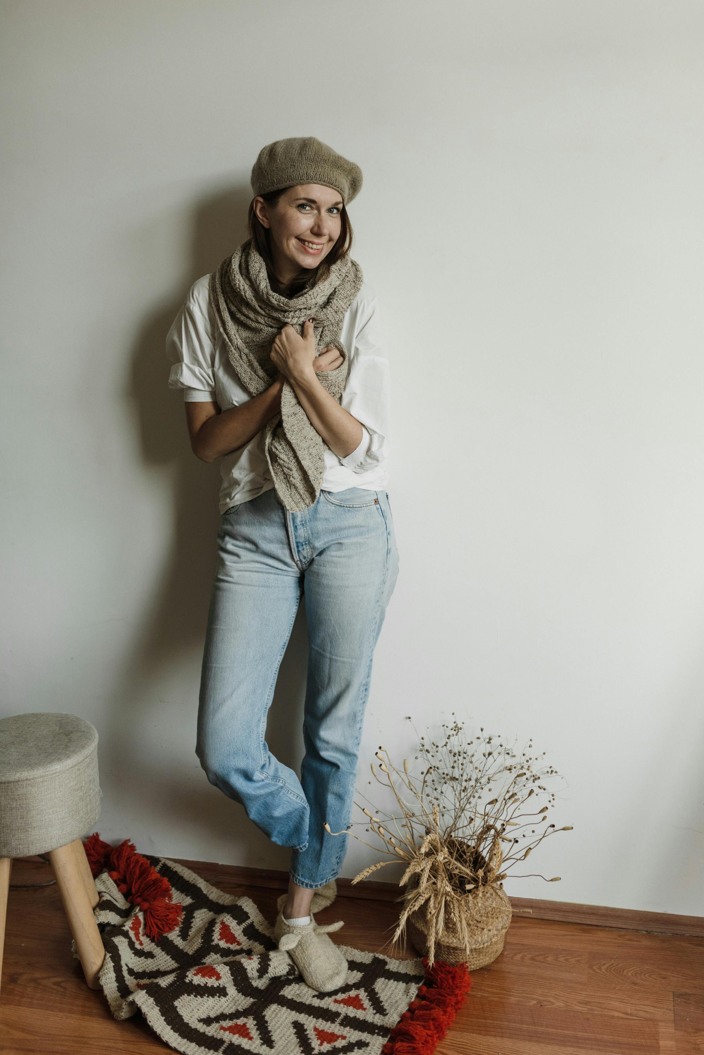 Woman in Blue Denim Jeans and Gray Scarf · Free Stock Photo