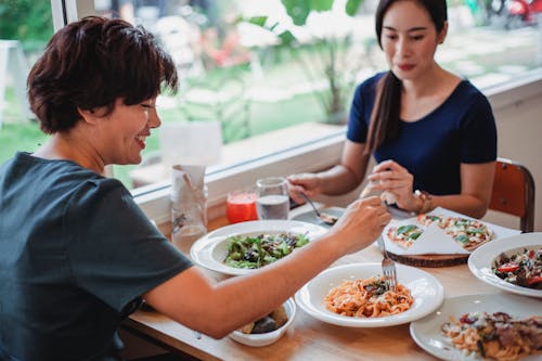 Free Asian women having lunch in restaurant Stock Photo