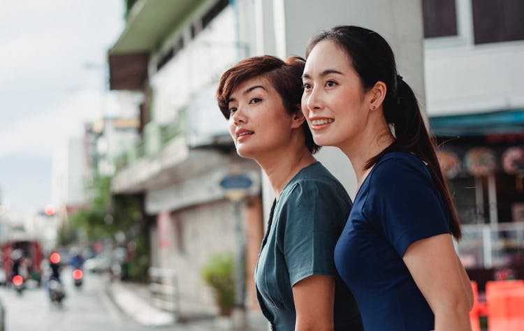 Charismatic Ethnic Women On City Street