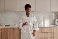 Woman in White Robe Standing