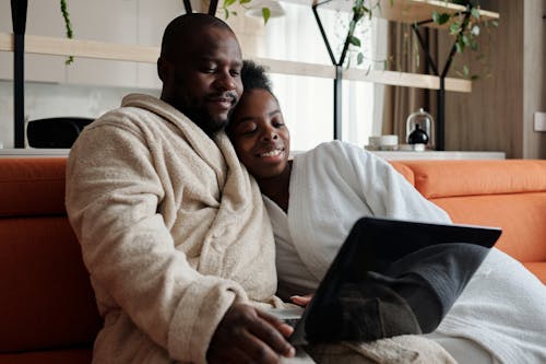 A Couple Watching on a Laptop