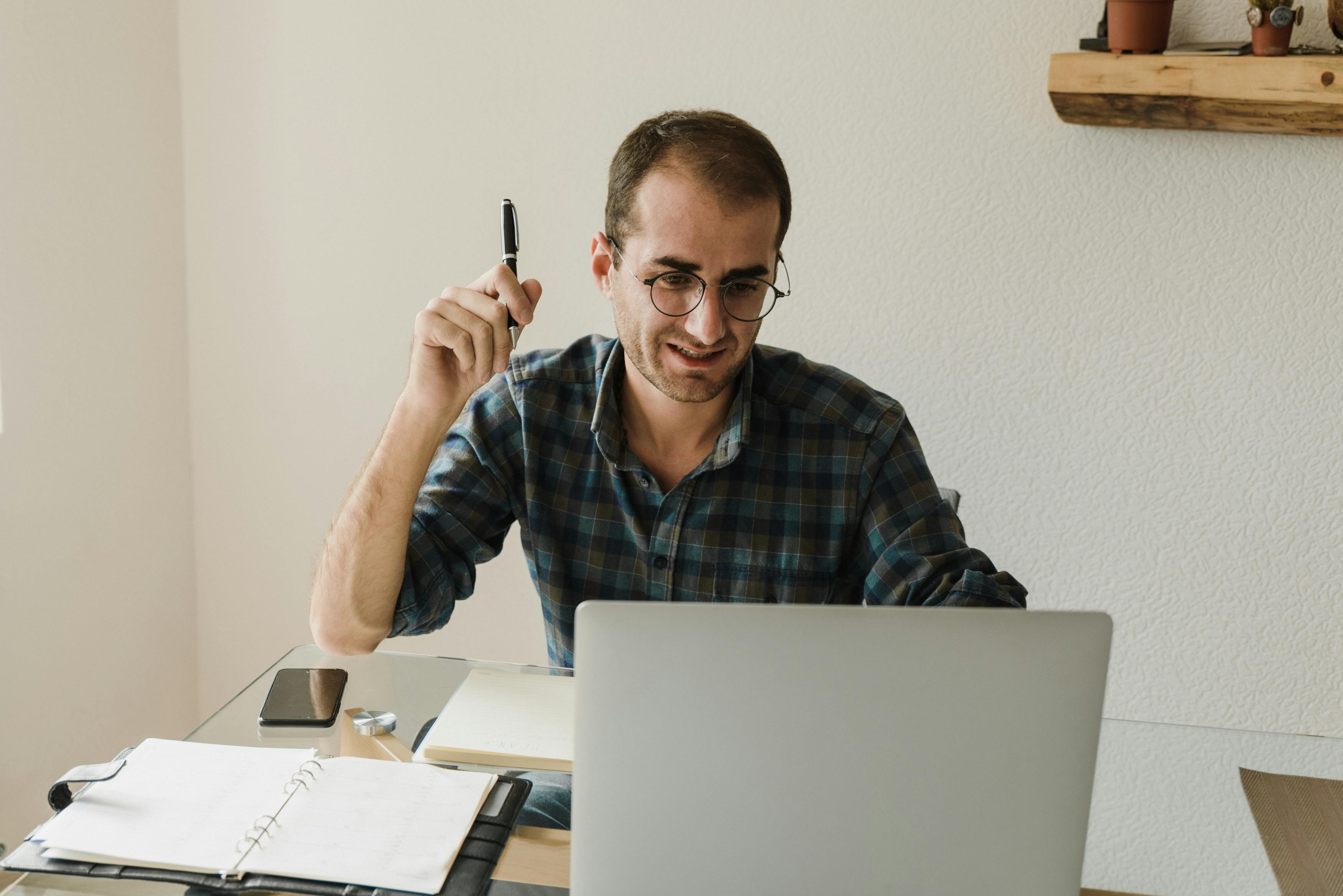 man people desk laptop