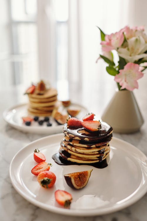 Free Chocolate Pancake With Strawberry on White Ceramic Plate Stock Photo