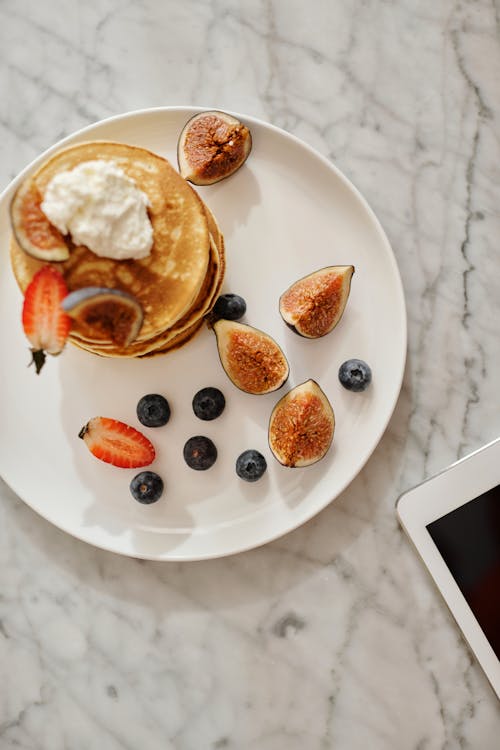 Pancakes on White Ceramic Plate