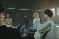 People Attending a Group Therapy Meeting