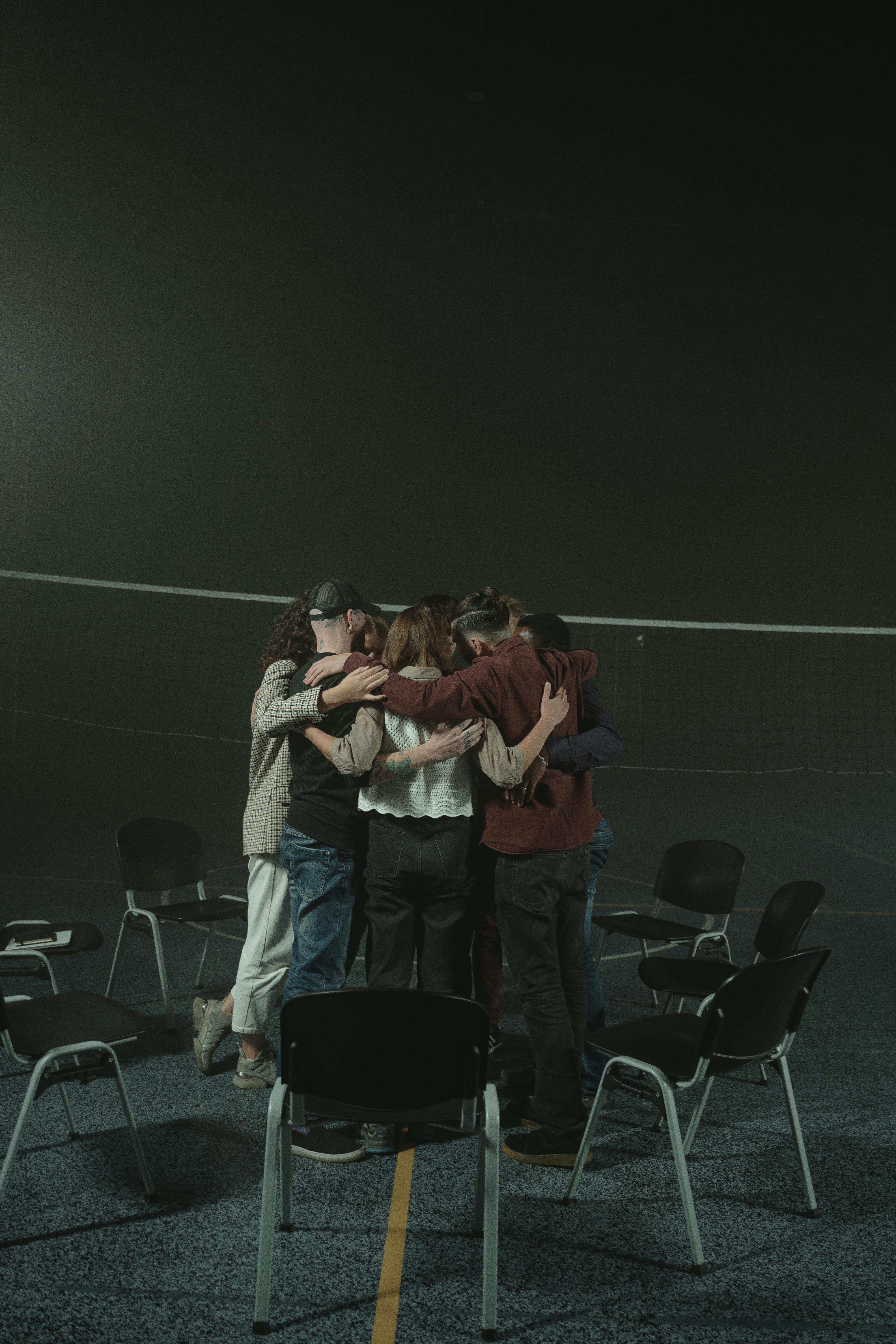 group of people standing on stage