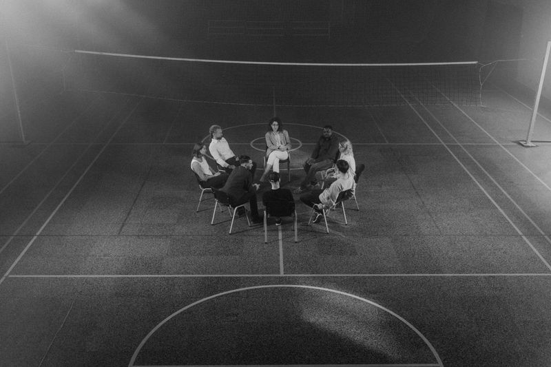 Group therapy circle, low light for privacy