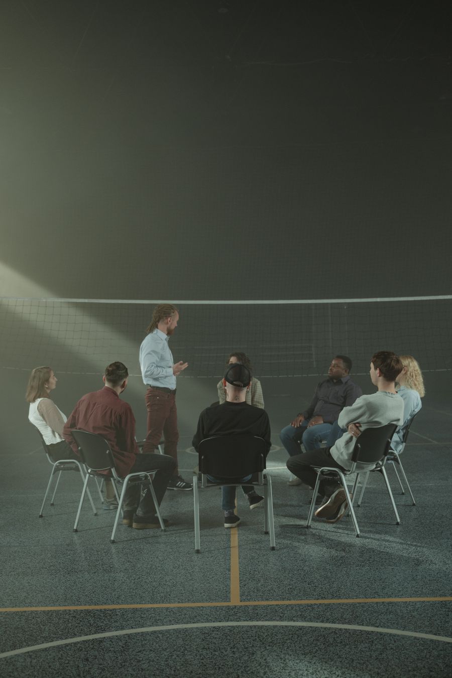 Adults participating in a structured group therapy session for partial hospitalization care