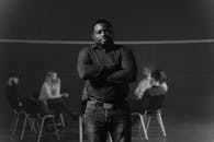 A Man Standing with his Arms Crossed