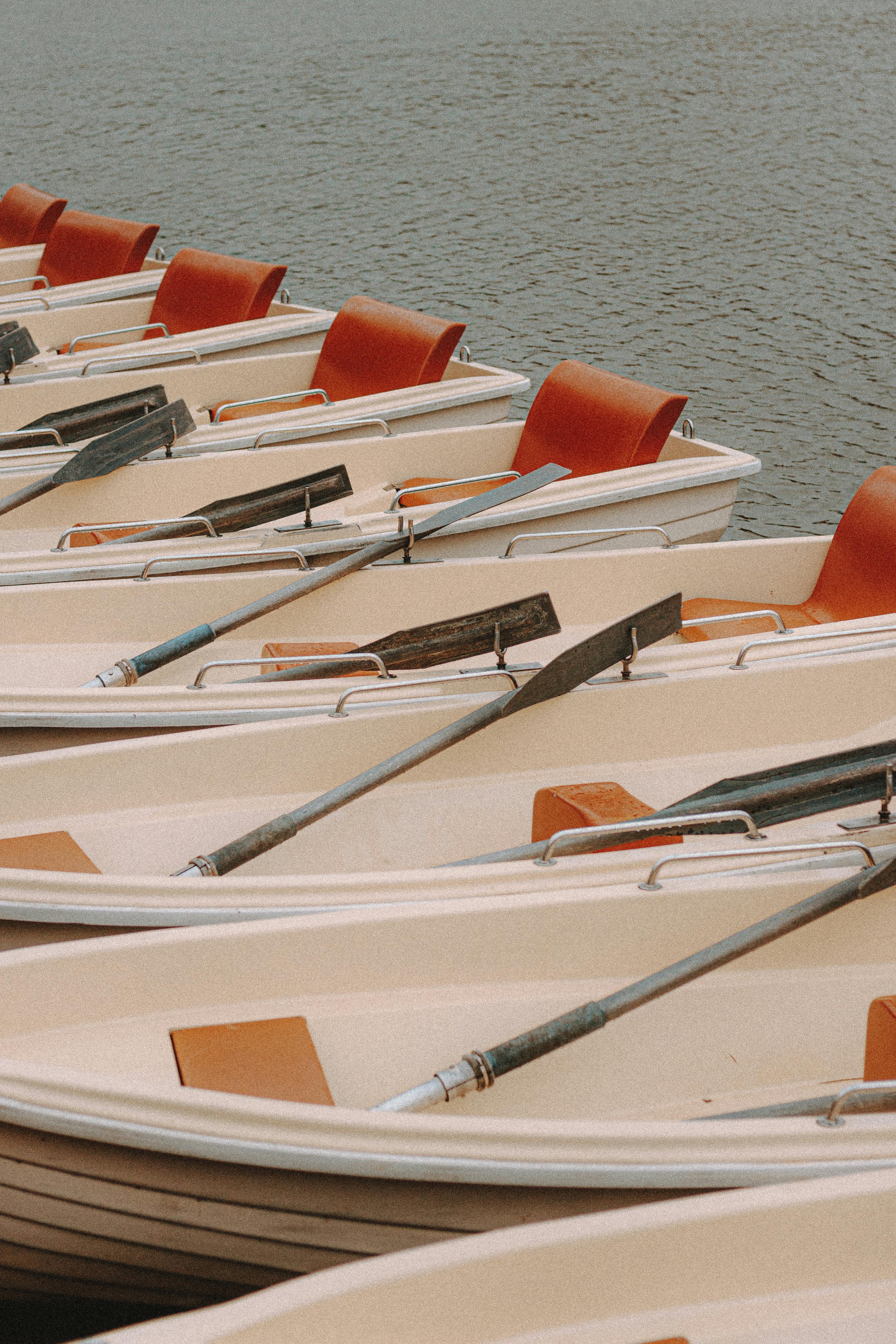 modern boats in row on river