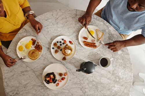 Free A Couple Eating Breakfast Stock Photo