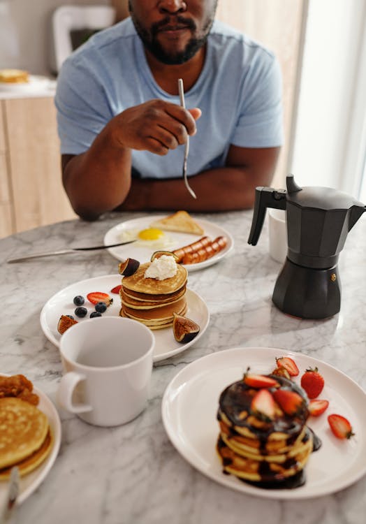 Free Man Having Breakfast Stock Photo