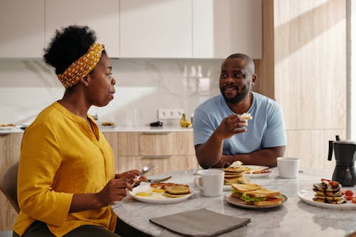 Free Couple Enjoying a Meal Together Stock Photo