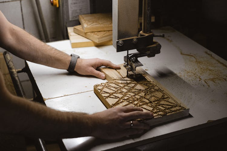 Man Working With Turning Machine And Wood