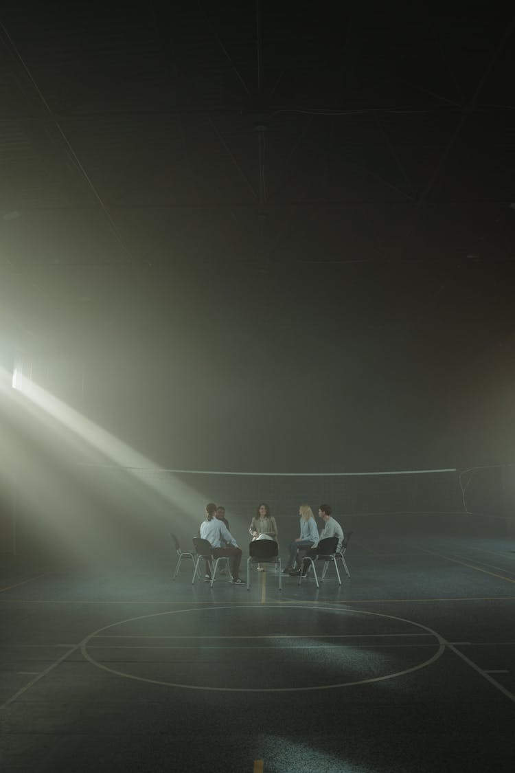 People Talking Together In The Volleyball Court