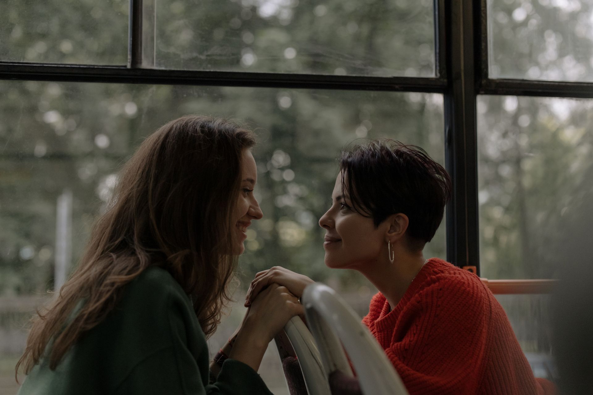 Women Looking at Each Other in the Bus