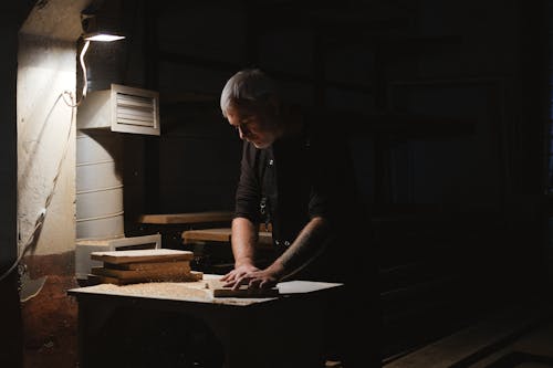 Professional Craftsman Working on Workbench 