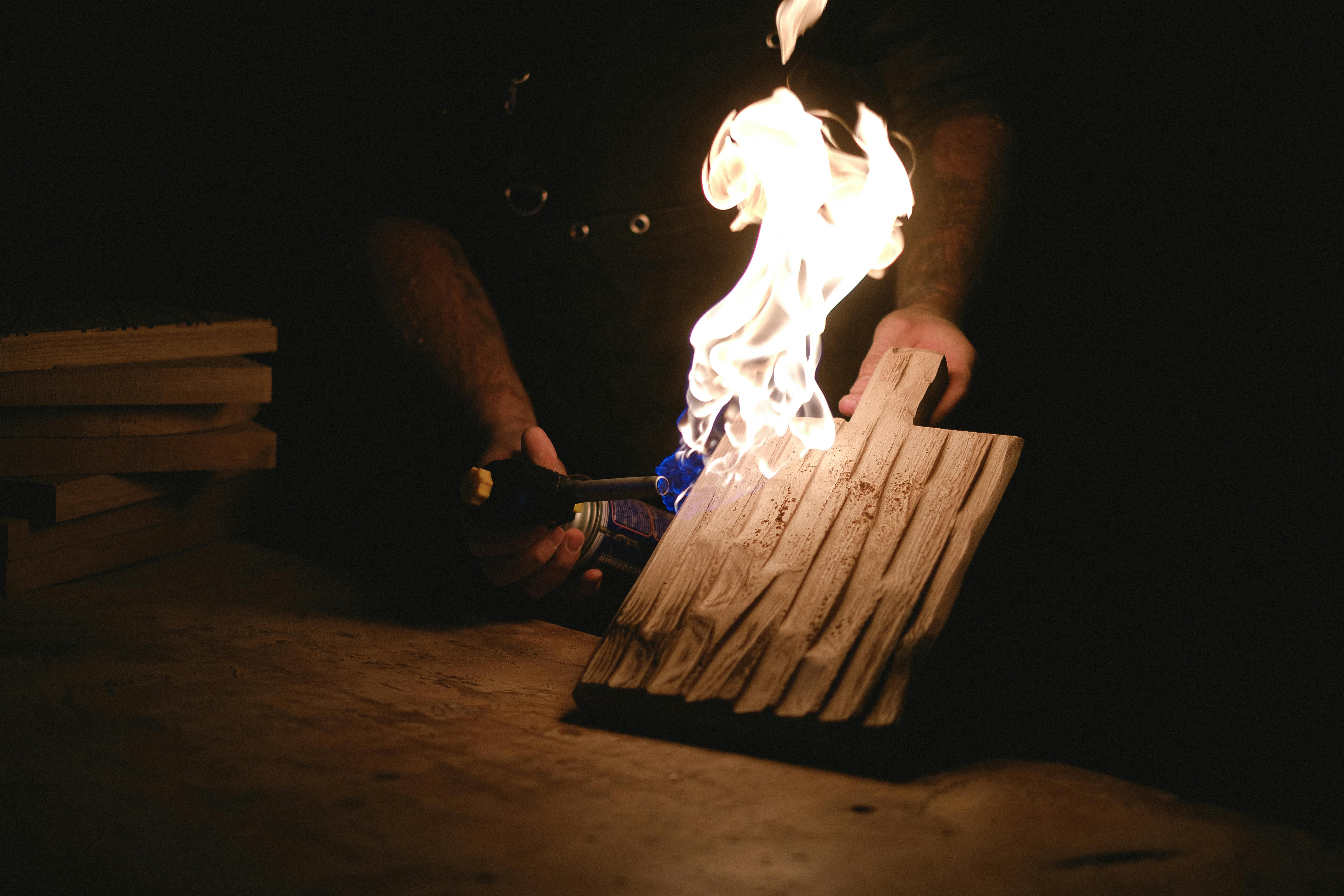 crop craftsman burning wooden board