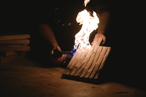 Crop craftsman burning wooden board