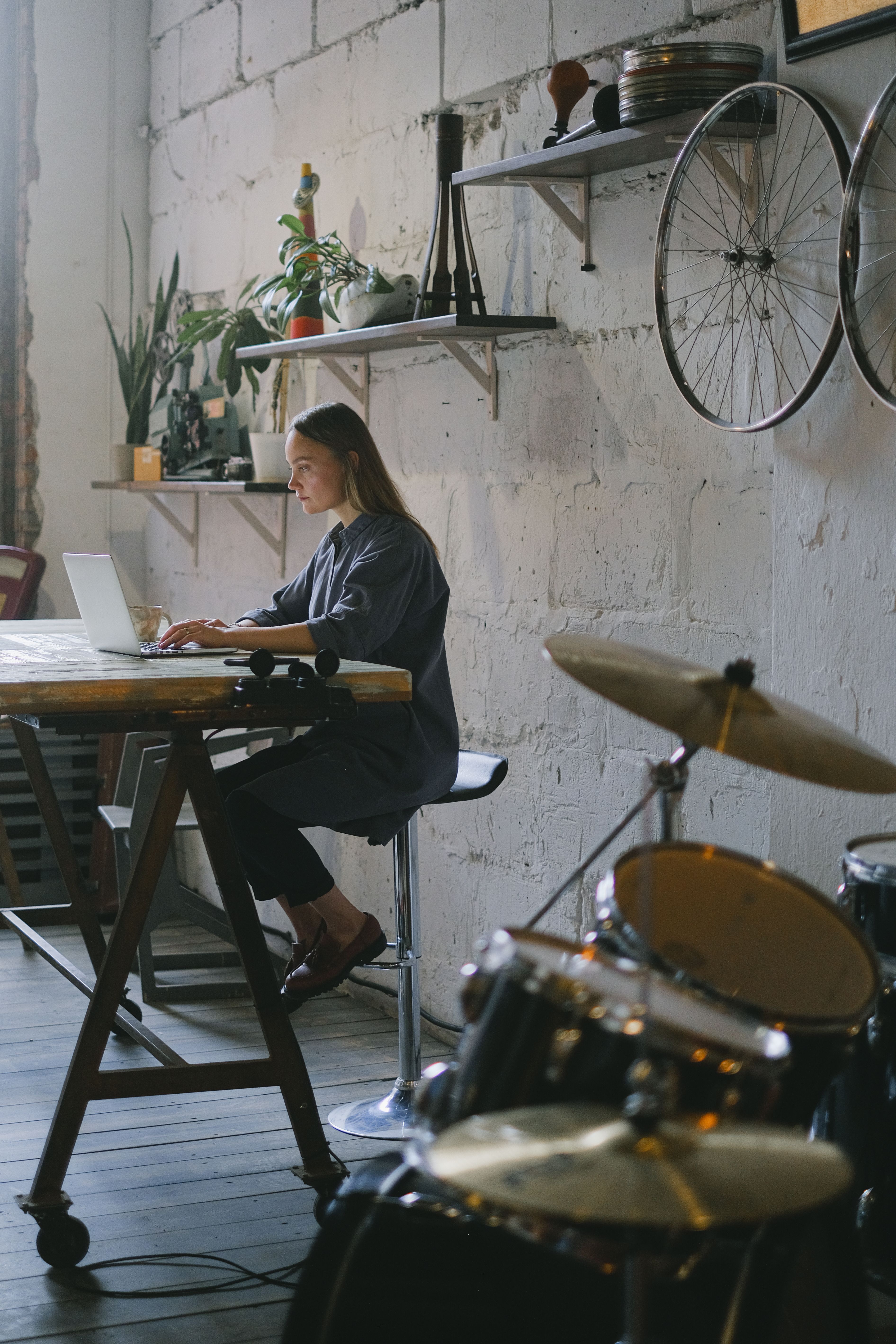 Couple reviewing documents while packing boxes