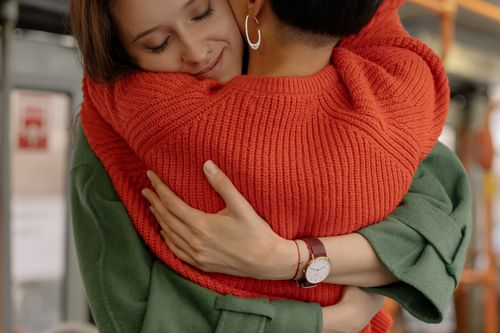 Free Two women sharing a warm embrace indoors, highlighting love and connection. Stock Photo