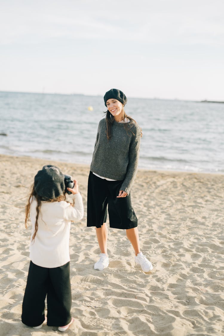 A Mother Posing On The Beach