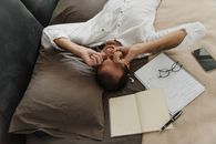 Man and Woman Lying on Bed