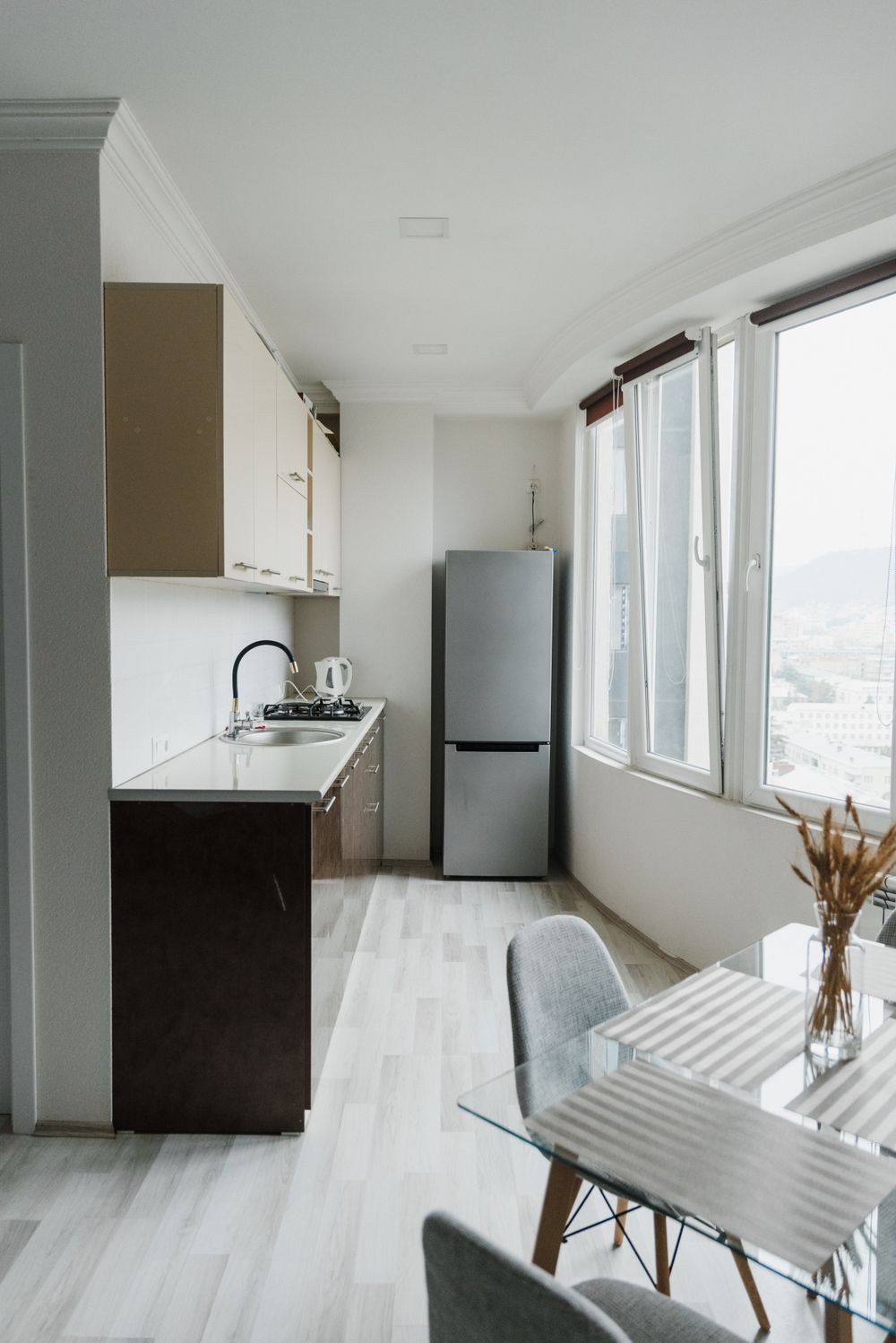 Fridge-freezer in a bright residential kitchen
