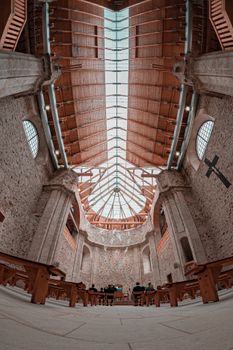 Stunning interior of Neratov Church showcasing its modern wooden ceiling and architecture.