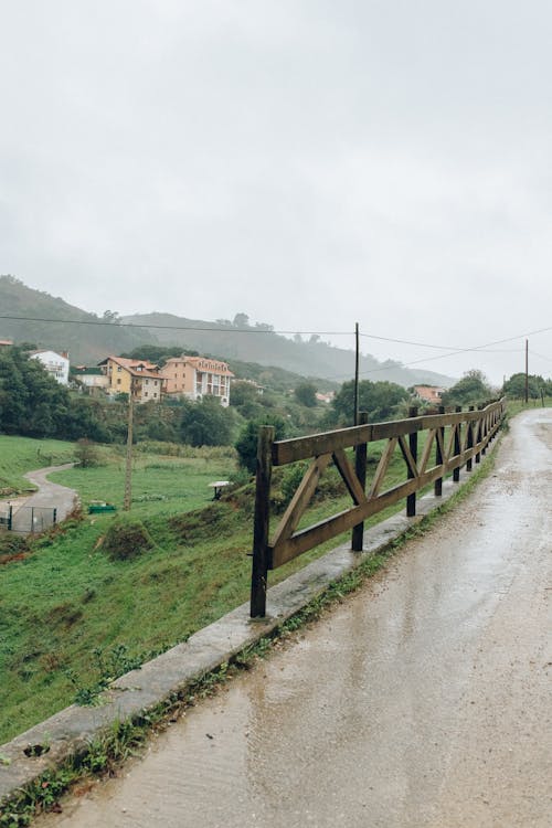 Wooden Fence on Dirt Road