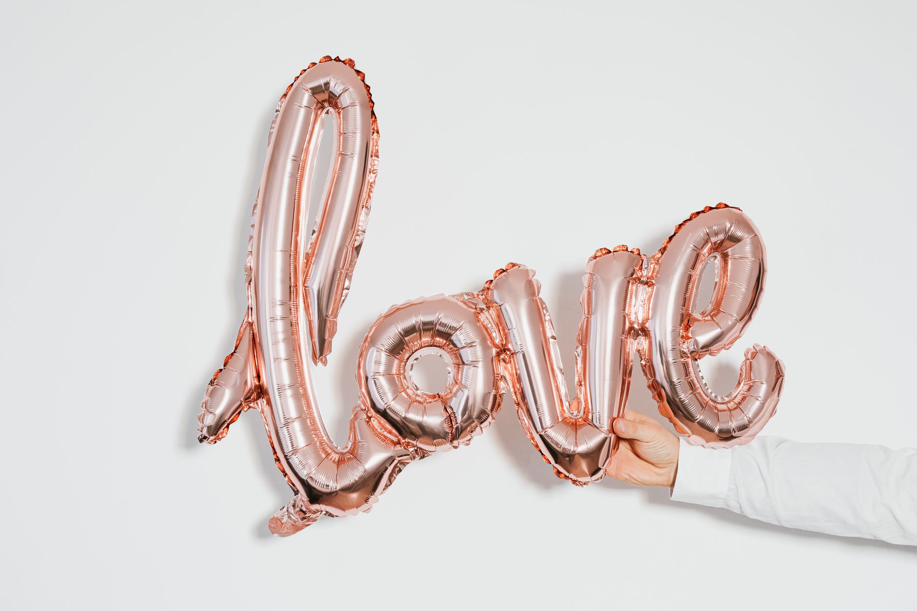 Person holding Love Balloon