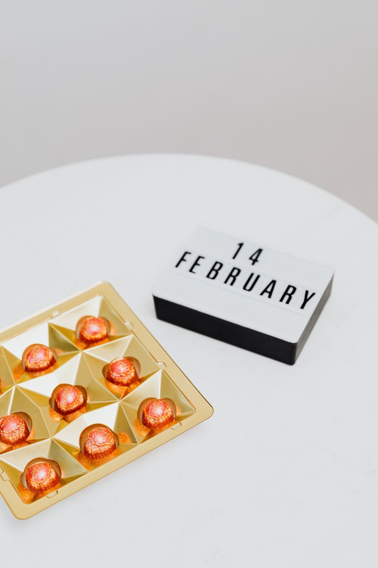 Chocolates And A Sign With The Valentines Day Date