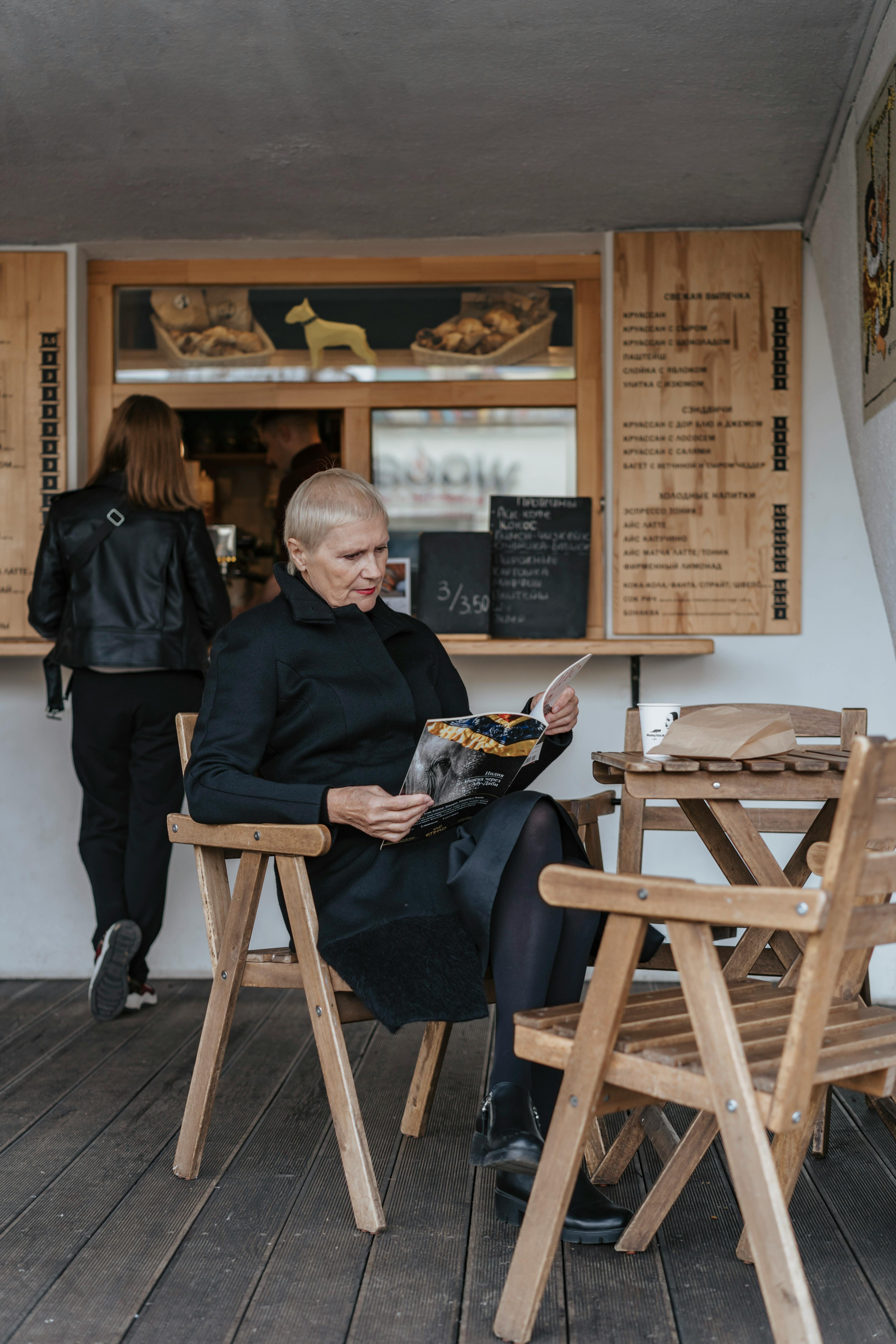 woman reading a magazine