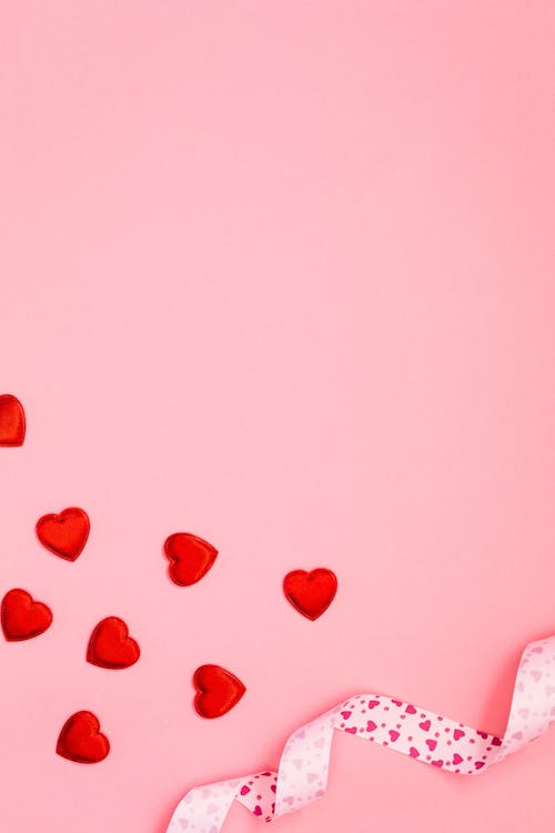 Free Hearts on Pink Background Stock Photo