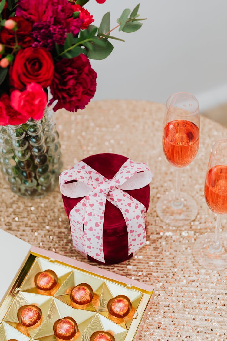 Close Up Of Gift, Chocolates And Flowers