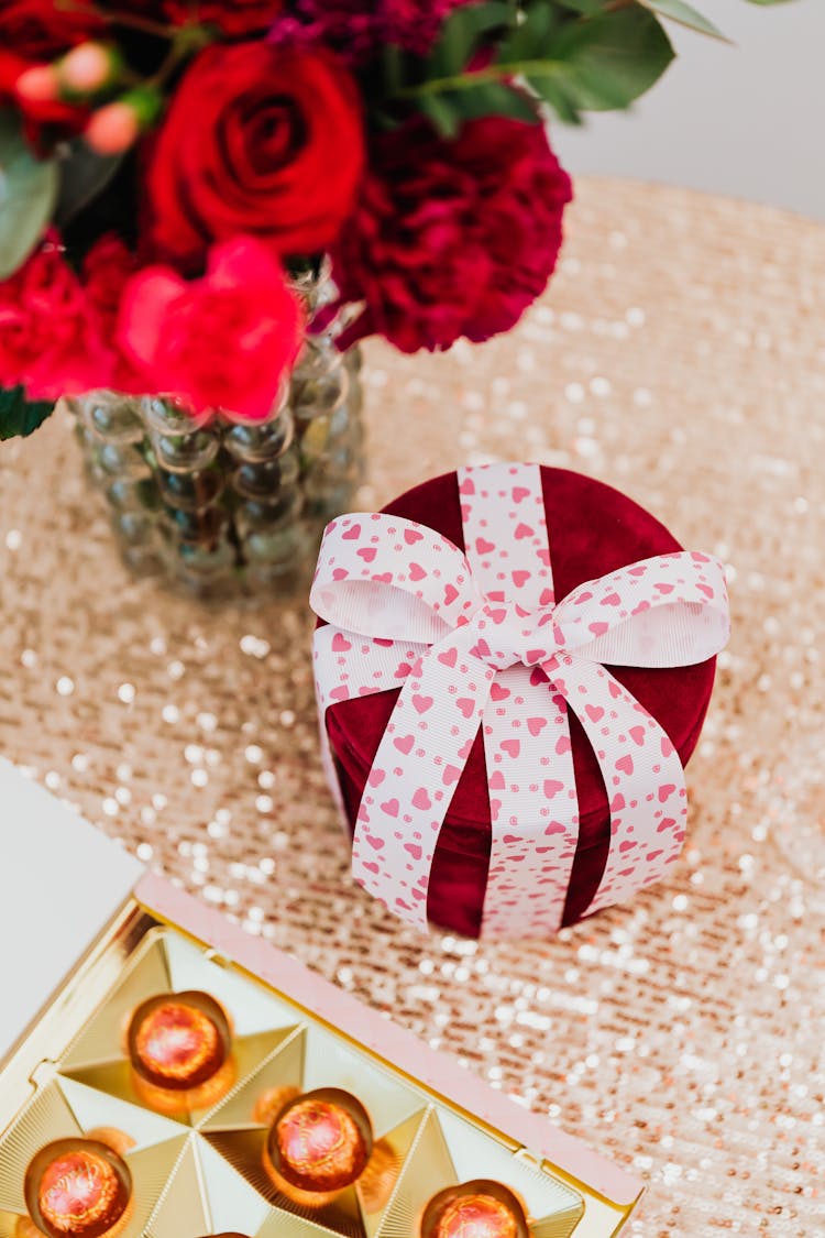 Close Up Of Gift, Chocolates And Flowers